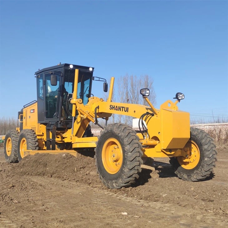 Motorgrader met laser voor beton